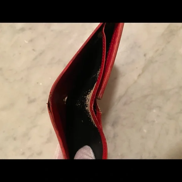Red leather Louis Vuitton wallet
